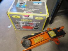 A boxed spray station and a car trolley jack
