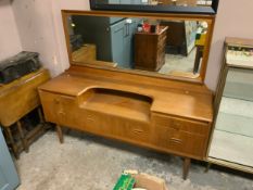 A mid-century teak dressing table W 144 cm