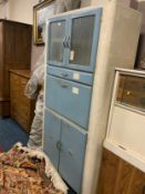 A mid century kitchen cabinet with drop-down front A/F