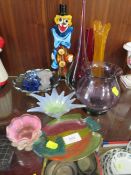 A collection of glass to include a Murano style clown and a Murano tear drop vase with original