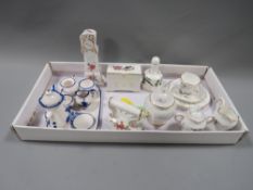 a selection of ceramic miniatures to include Aynsley and Coalport etc