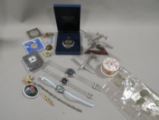 A jewellery box and contents to include coins etc