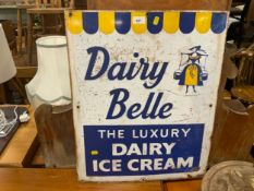 A vintage enamel sign ‘Dairy Belle the luxury dairy ice cream’
