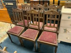 A set of six Edwardian oak dining chairs