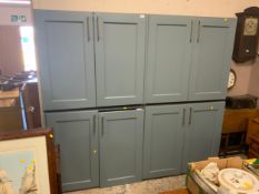 A large set of four 2 door shaker style kitchen cabinets, some with drawers