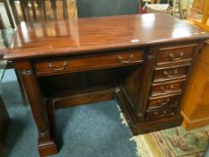A reproduction pedestal type desk W 115 cm