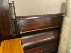 A modern double sleigh bed frame
