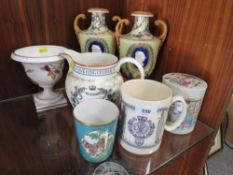 A selection of ceramics to include a pair of Continental style urns on plinths etc