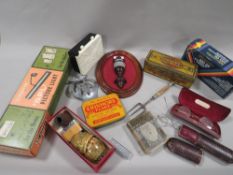 A tray of collectables to include vintage brass dominoes, AA badge, spectacles etc