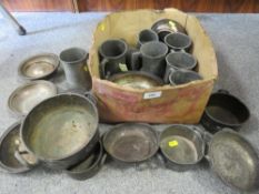 A tray of assorted metal ware to include pewter examples