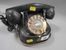 A model T.T.R. 1949 telephone with brass carrying handle