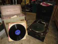 A vintage Edison Bell wind up gramophone together with a case of 78