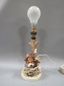 A vintage Goebel Hummel figural table lamp