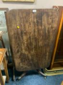 An antique mahogany tilt top pedestal table A/F