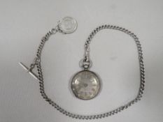 AN ANTIQUE SILVER POCKET WATCH ALBERT CHAIN AND WATCH
