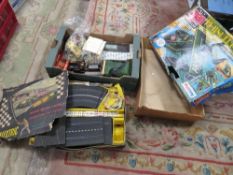 Various model railway items together with Scalextric track and accessories and an empty vintage