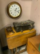 A modern wallclock together with an oak dropleaf table, a cuckoo clock, a leather case,