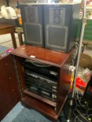 A Sony retro hi-fi system and speakers in modern mahogany cabinet