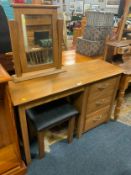 A modern light oak single pedestal dressing table with stool and mirror