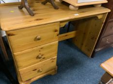 A small honey pine desk