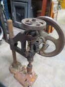 A vintage bench top hand drill / stand