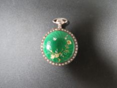 A Victorian silver and enamel ladies watch set with pearls