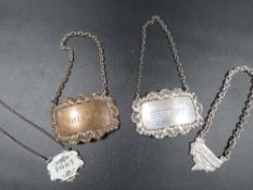 Four hallmarked wine label or bottle tickets