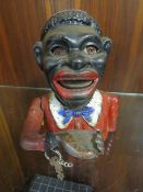 A cast metal money bank