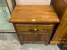 A small colonial style cabinet