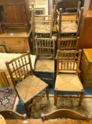 Eight assorted antique oak wicker seat dining chairs
