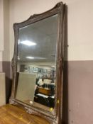 A large modern wall mirror 115 x 84 cm