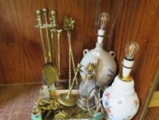 A selection of brass ware to include horse brasses and lamps etc