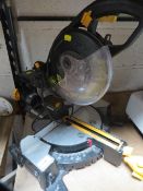 A bench top slide compound mitre chain saw