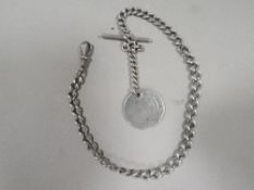 An antique silver gents pocket watch Albert chain