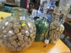 Two converted demi-john bottle lamps together with a carboy and contents