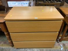 A modern three draw light oak chest