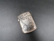 An antique H.M. silver vesta case