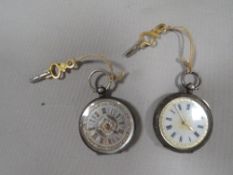 Three antique silver cased ladies pocket watches
