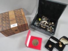 A box of vintage coins and watches together with a small box of costume jewellery