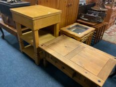 A modern butcher style block table together with a colonial coffee table
