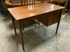 A mid-century teak two drawer desk W 101 cm