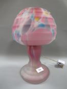 An unusual vintage one piece multicoloured mottled glass table lamp in the form of a mushroom