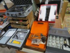 A selection of testing equipment, a cased 'cupping therapy' kit , point of sale and an engineers