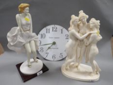A resin figure of Marilyn Monroe (height approx 44cm) together with a three nymph figurine and a
