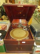 A cased HMV table top gramophone