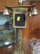 An unusual vintage chinese brass lantern, decorated with dragons and birds with bell drops and