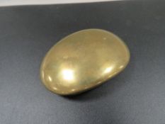 A 19th century brass snuff box