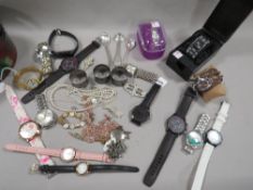 A quantity of watches, costume jewellery etc.