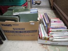 A box of modern Charles Dickens books together with a tray of maps etc