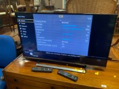 A Panasonic 40 inch colour television - House Clearance with remotes